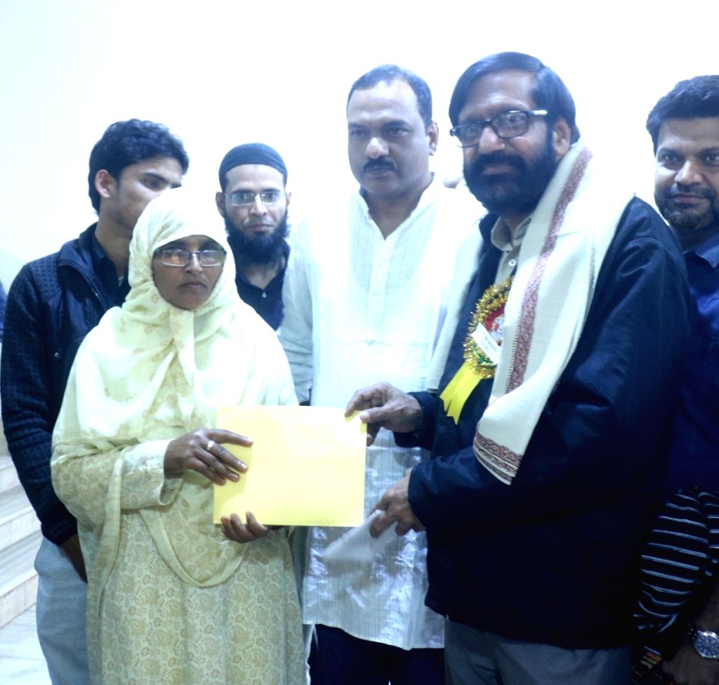 K.P. Ramanunni contributes his award prize money to mother of Junaid