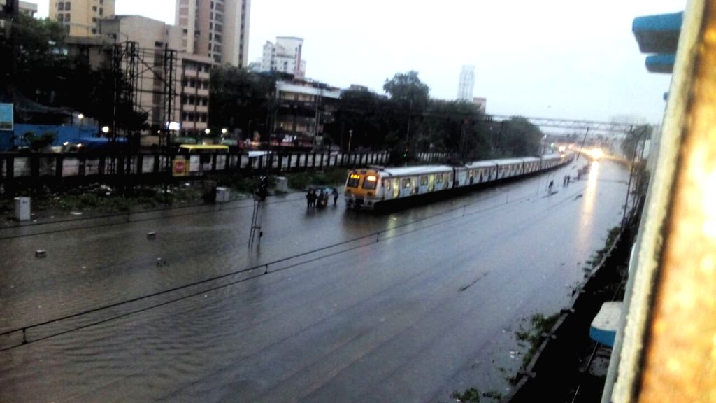 Heavy rain hit train services in Mumbai