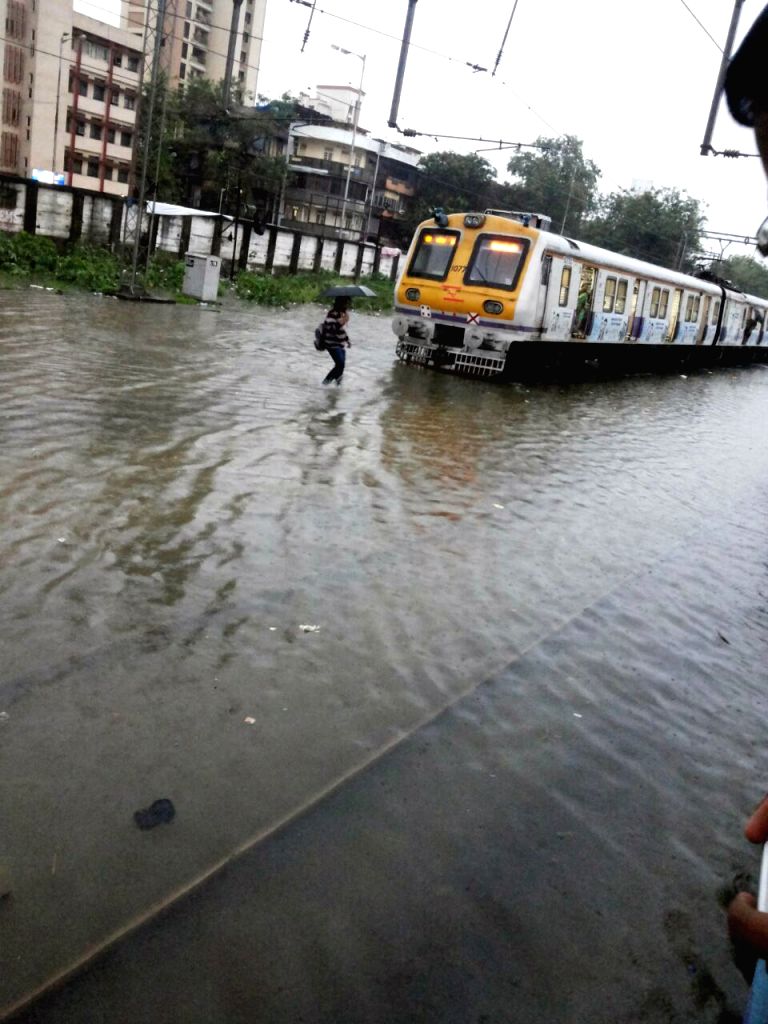 Heavy rain hit train services in Mumbai
