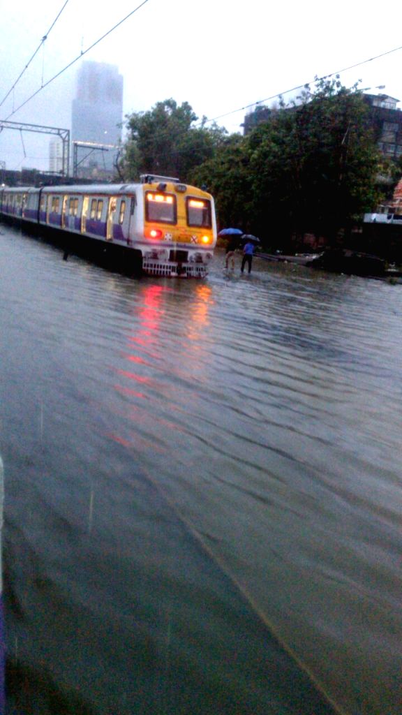 Heavy rain hit train services in Mumbai