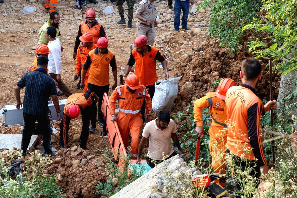 NDRF personnel conduct rescue operation after bridge collapse