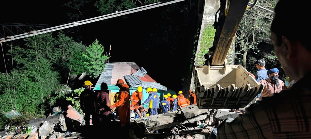Ndff Rescue NDRF personnel durig a Rescue and relief operation after a Building ...