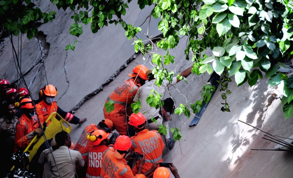 Ndff Rescue NDRF team during a rescue operation after an under-construction ...
