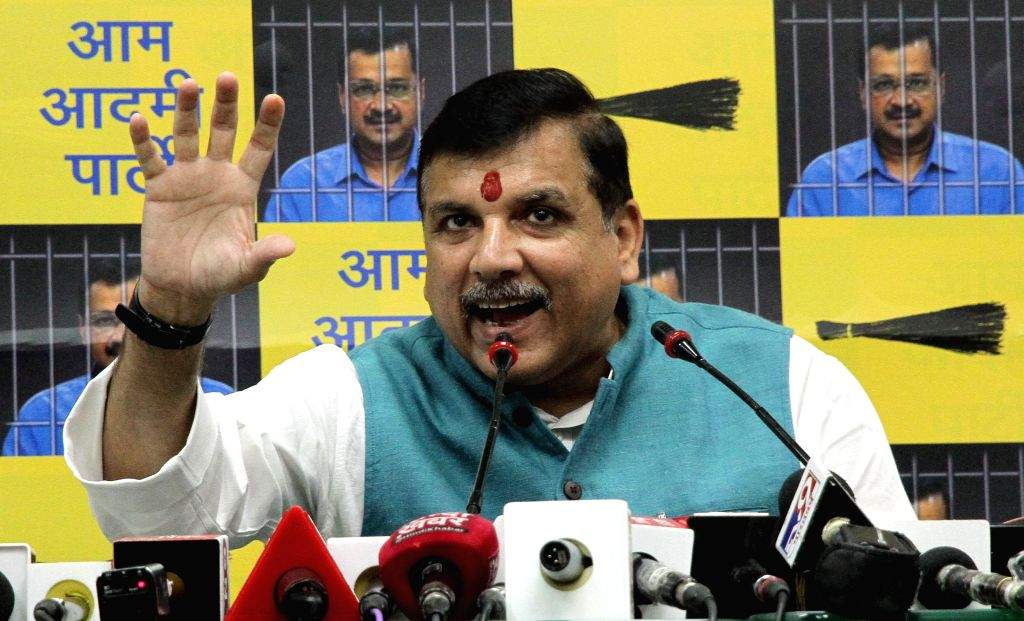AAP leader Sanjay Singh addresses a press conference at party office
