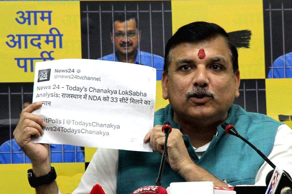 AAP leader Sanjay Singh addresses a press conference at party office