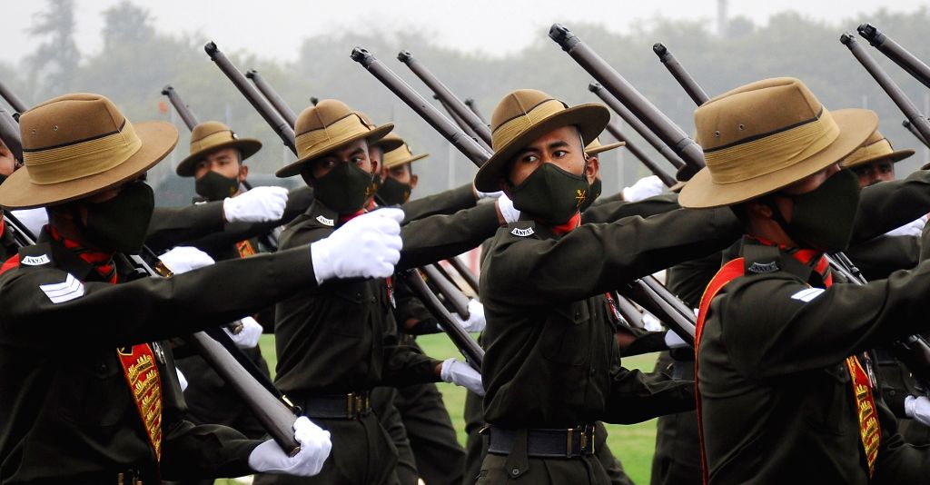 New Delhi:Assam Rifles Contingents passing through saluting dais during ...