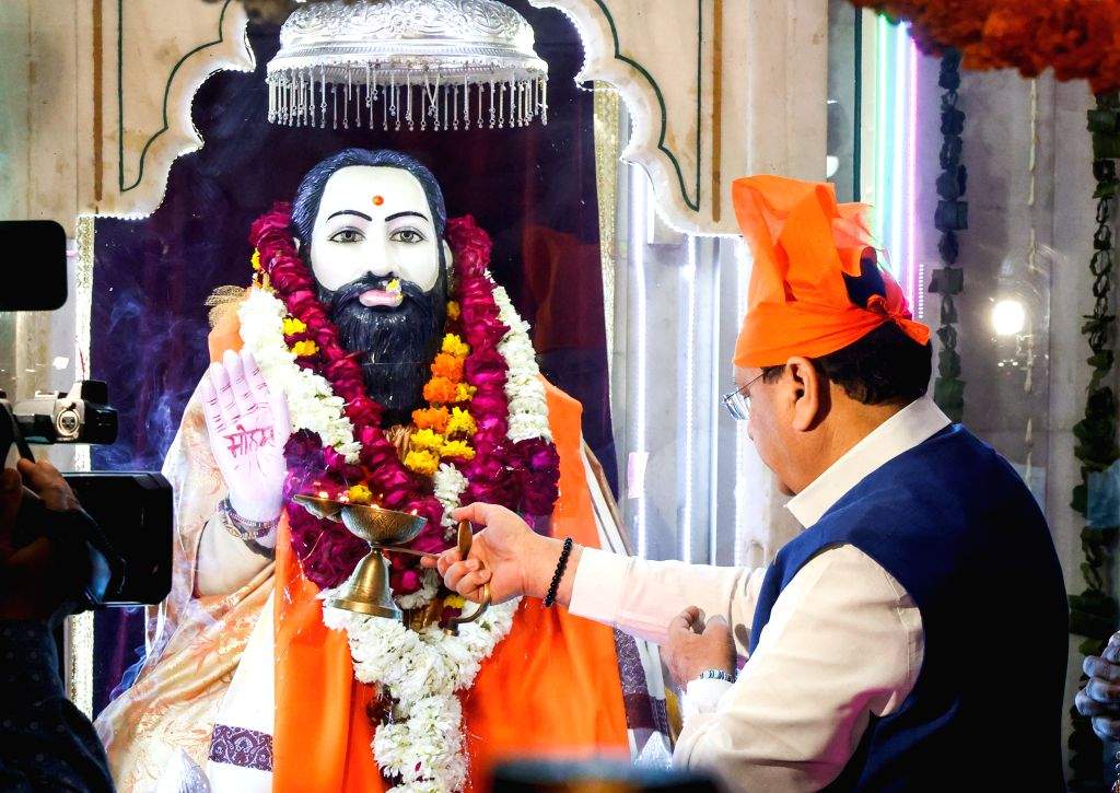 BJP National President J.P. Nadda offers prayers at the Guru Ravidas ...