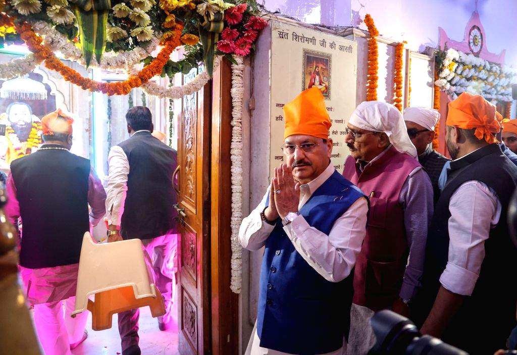 BJP National President J.P. Nadda offers prayers at the Guru Ravidas ...