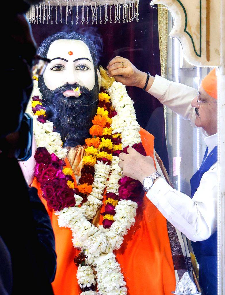 BJP National President J.P. Nadda offers prayers at the Guru Ravidas ...