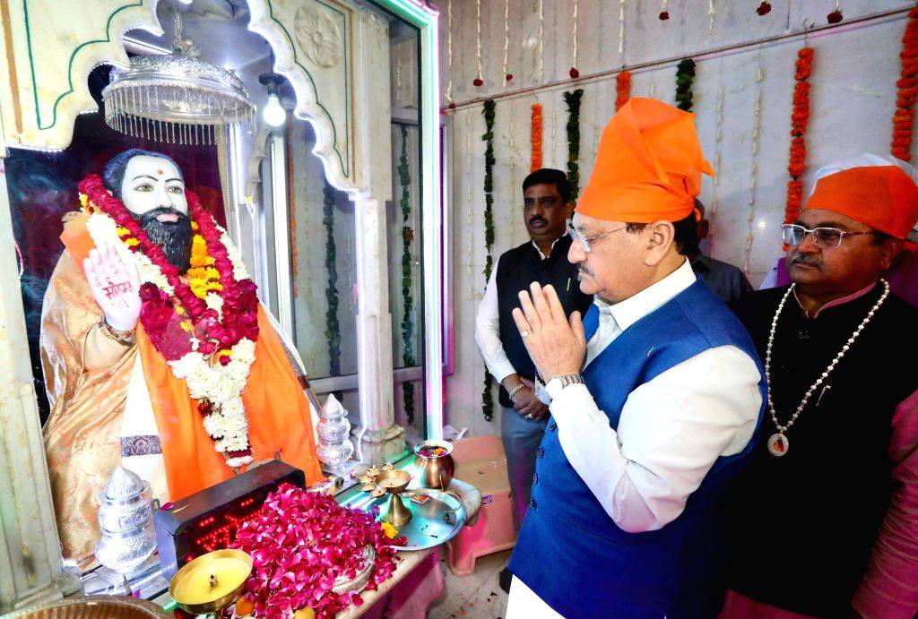 BJP National President J.P. Nadda offers prayers at the Guru Ravidas ...