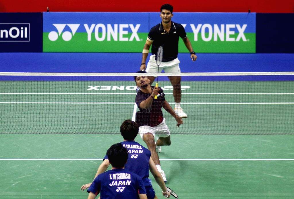 New Delhi : India's Krishna Prasad Garaga and Sai Pratheek K in action ...