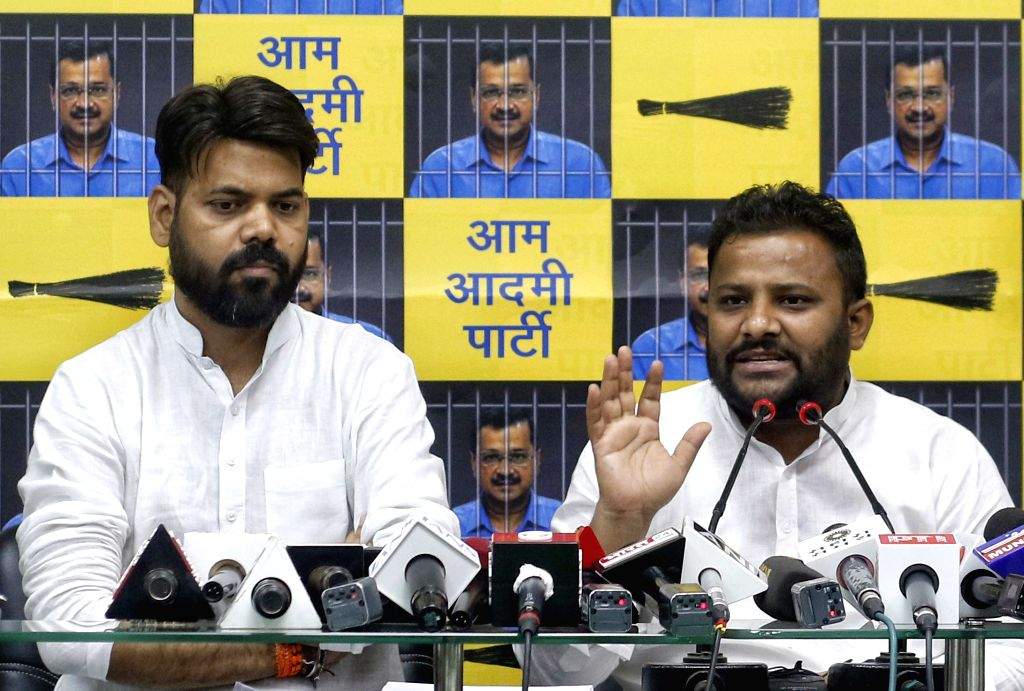 Senior AAP leaders Praveen Kumar and Kuldeep Kumar address a press ...