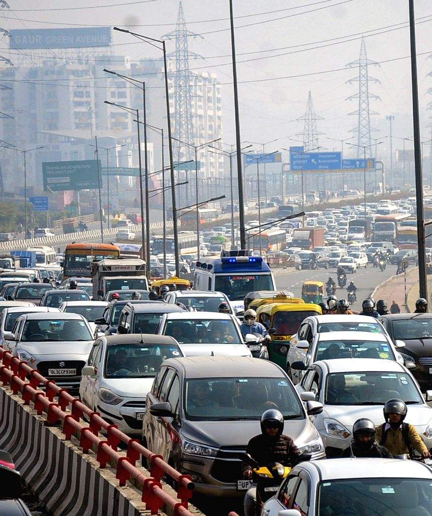New Delhi : Vehicles stuck in a traffic jam near Gazipur Border in view ...