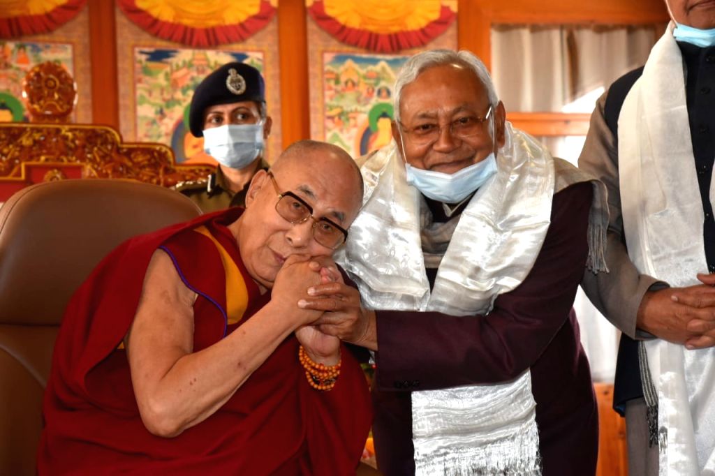 Free Photo Nitish met the religious leader Dalai Lama after reaching