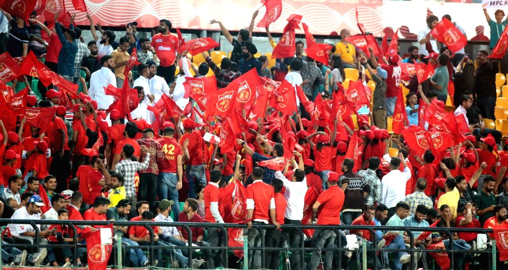: Dharamshala : PBKS' fans cheer during the IPL 2023 match