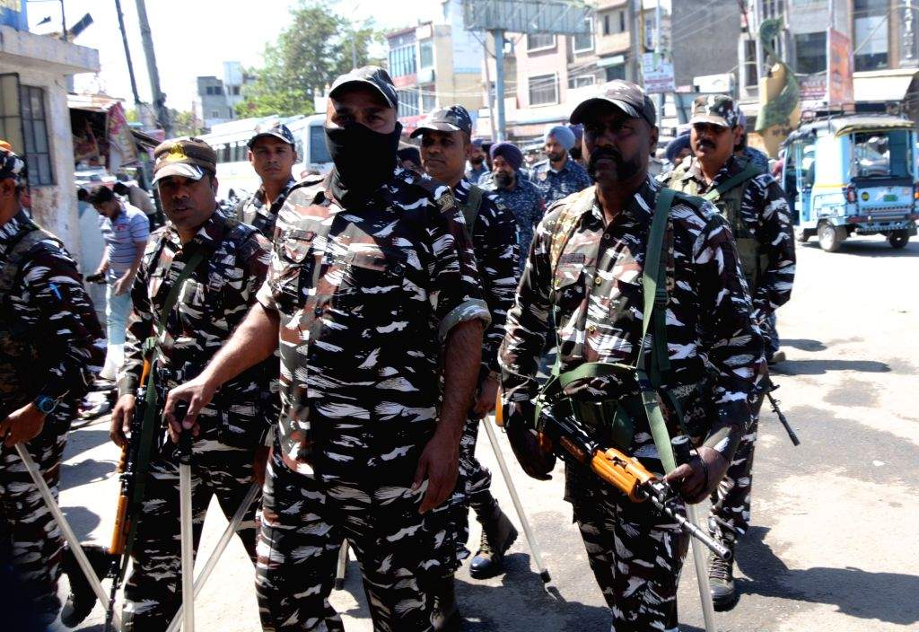 Police and paramilitary forces conduct a flag march ahead of the ...