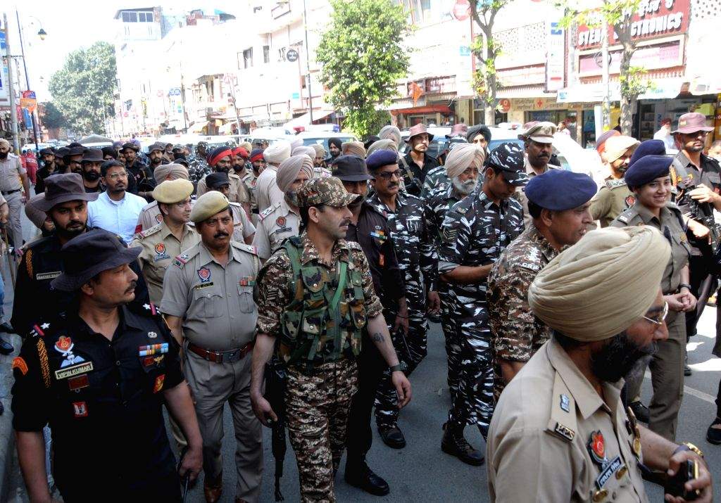 Police and paramilitary forces conduct a flag march ahead of the ...