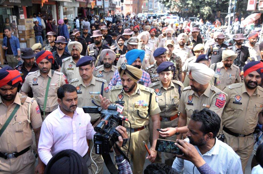 Police and paramilitary forces conduct a flag march ahead of the ...