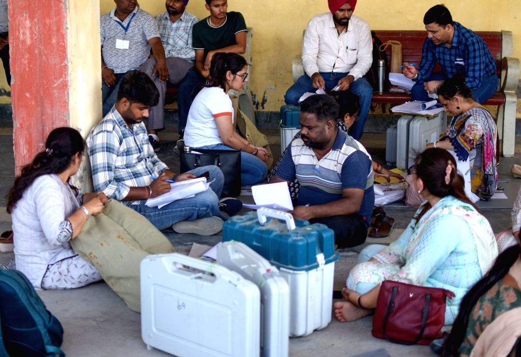 Poll Material Polling officials, along with the election materials leave for their ...