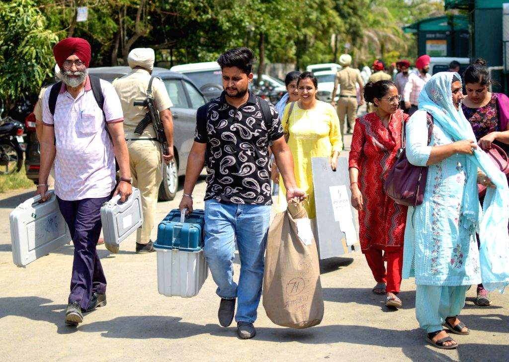 Poll Material Polling officials, along with the election materials leave for their ...