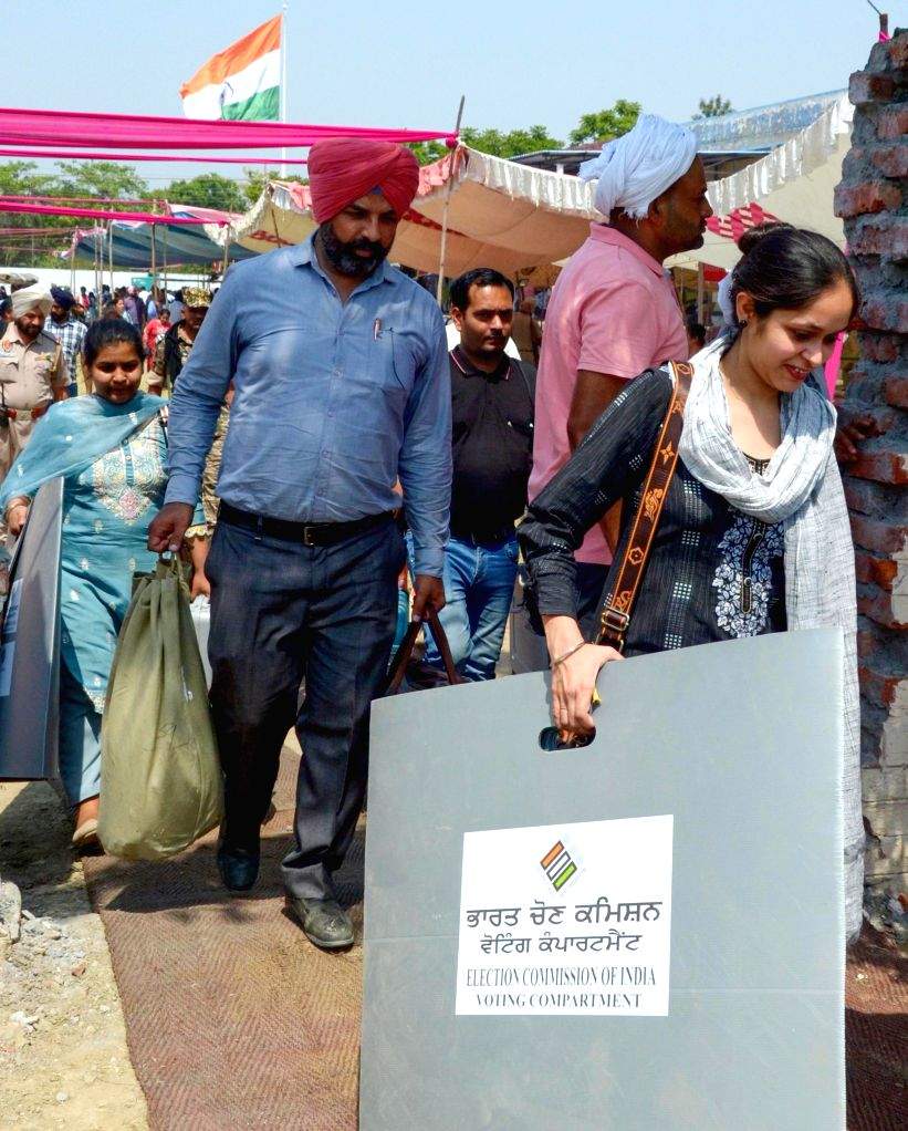 Poll Material Polling officials, along with the election materials leave for their ...