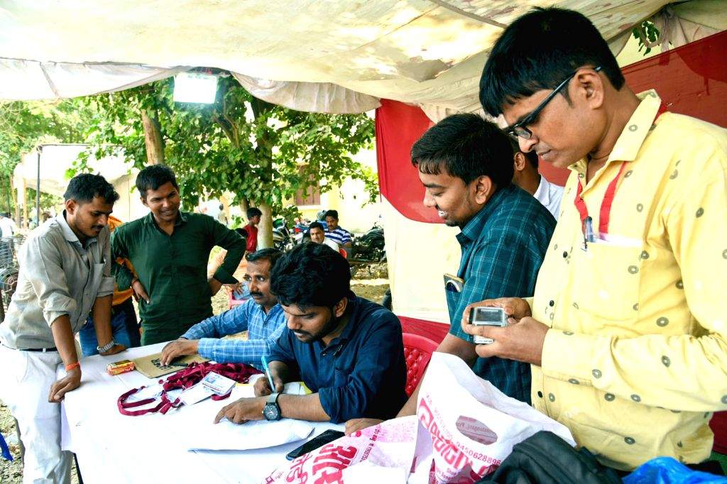 Poll Material Polling officials collect poll materials required for the 6th Phase of ...
