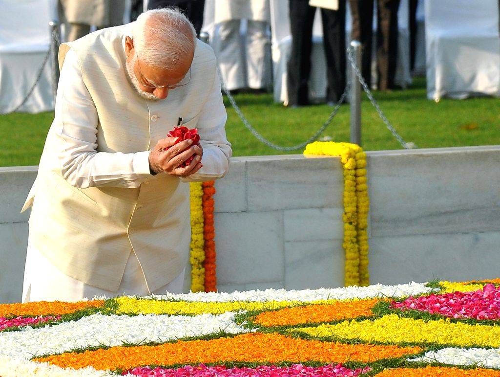 Modi Gandi Prime Minister Narendra Modi pays homage to Mahatma Gandhi
