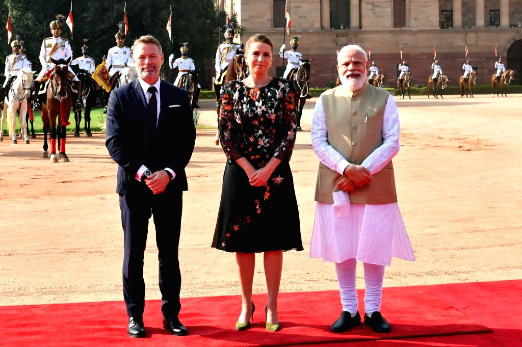 Prime Minister Narendra Modi, right, poses for the media with his ...