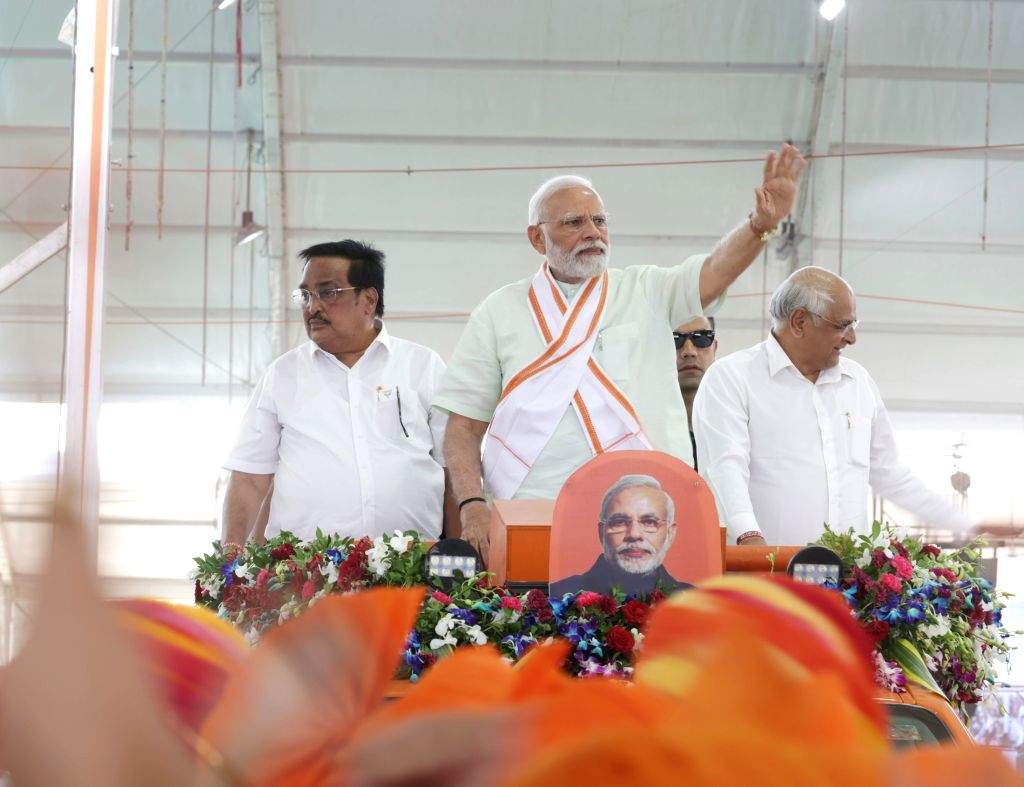 Wave Fi Modi Prime Minister Narendra Modi waves at supporters as he arrives for an ...