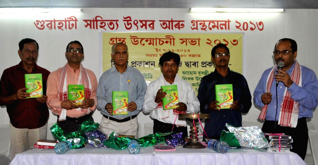 Kula Saikia releases Adip Kumar Phukan's book 'Asomor Krishi Arthaniti'