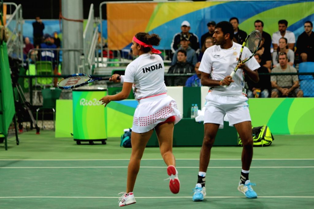 Rio de Janeiro: Tennis - Sania Mirza and Rohan Bopanna in action