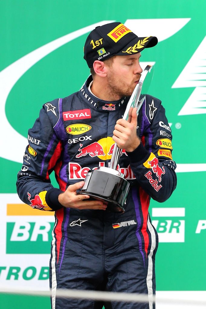 Sebastian Vettel racing at the Brazilian Grand Prix during 2013 season