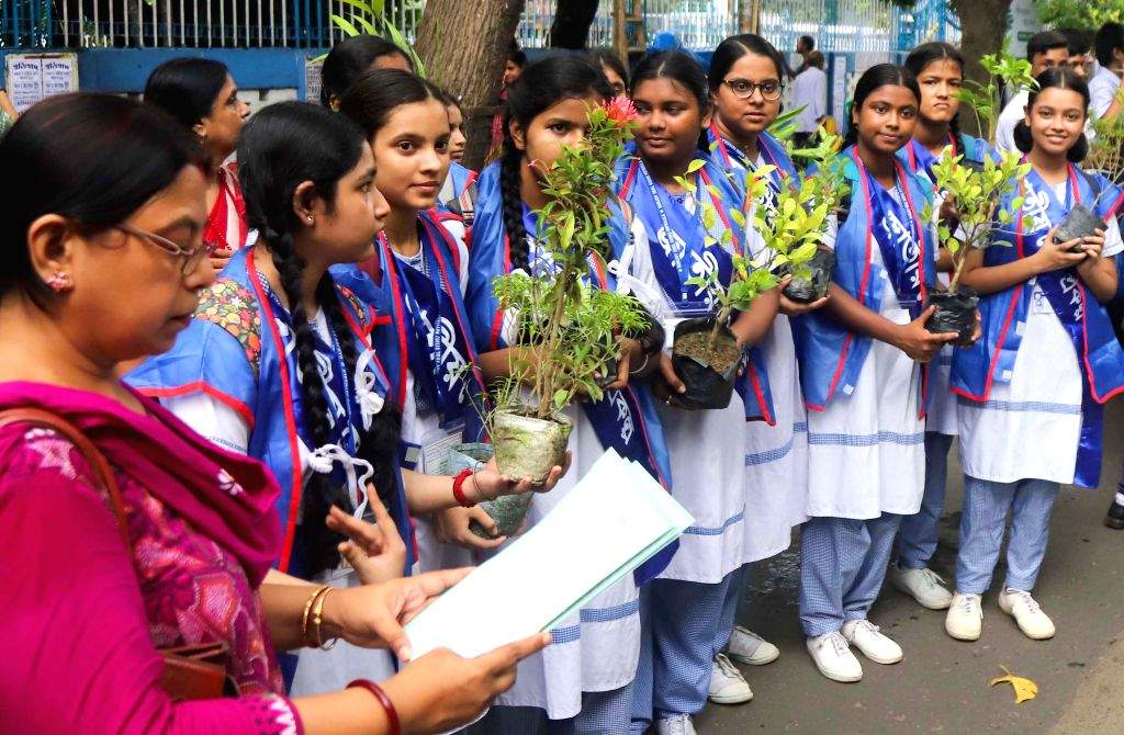 School students participate in a tree plantation program