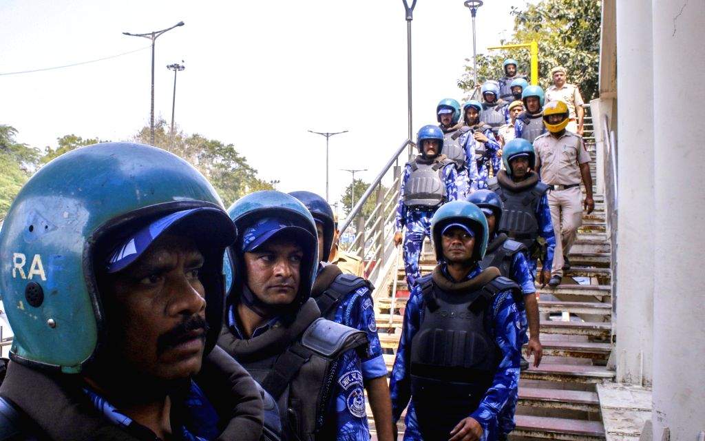 Security personnel during AAP protest at ITO against the arrest of ...