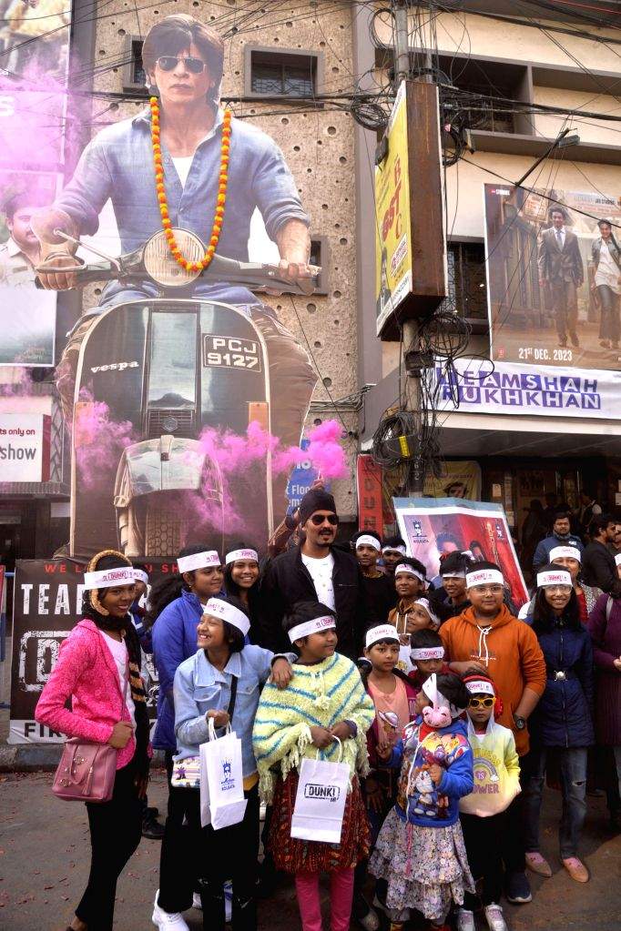 Shah Rukh Khan fans celebrate the release of his film 'Dunki