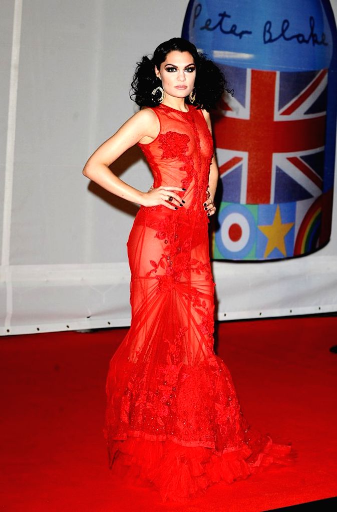 jessie j red dress Jessie J pens realistic postpartum recovery message: 'Take your time'