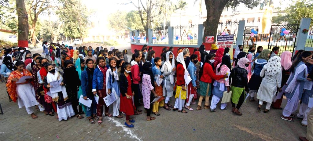 Students In Queue Students wait in queue as they arrive to appear for the class 10th ...