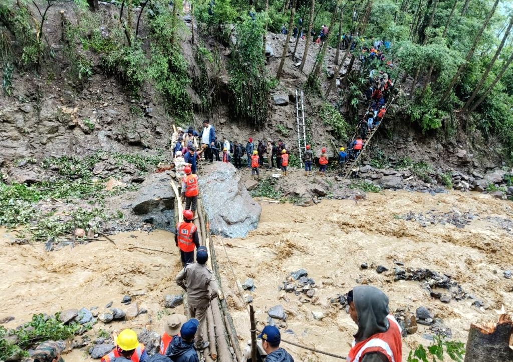 Free Photo :Tourists stranded in Sikkim due to heavy rainfall, 2000 ...