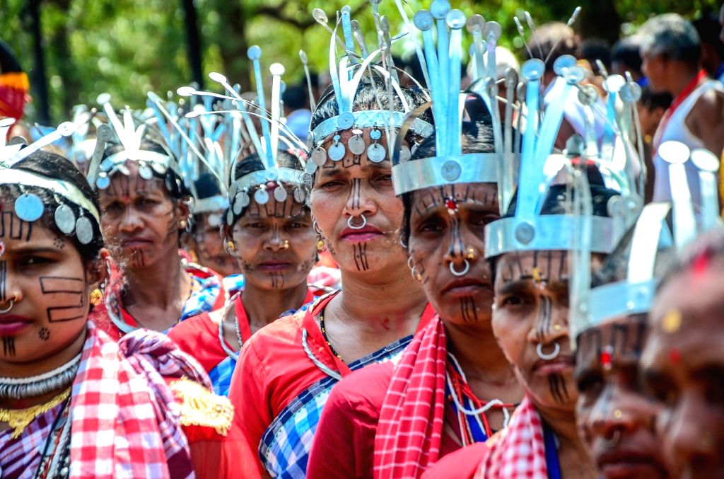 Tribal artists during a protest by State Council for Renovation of ...