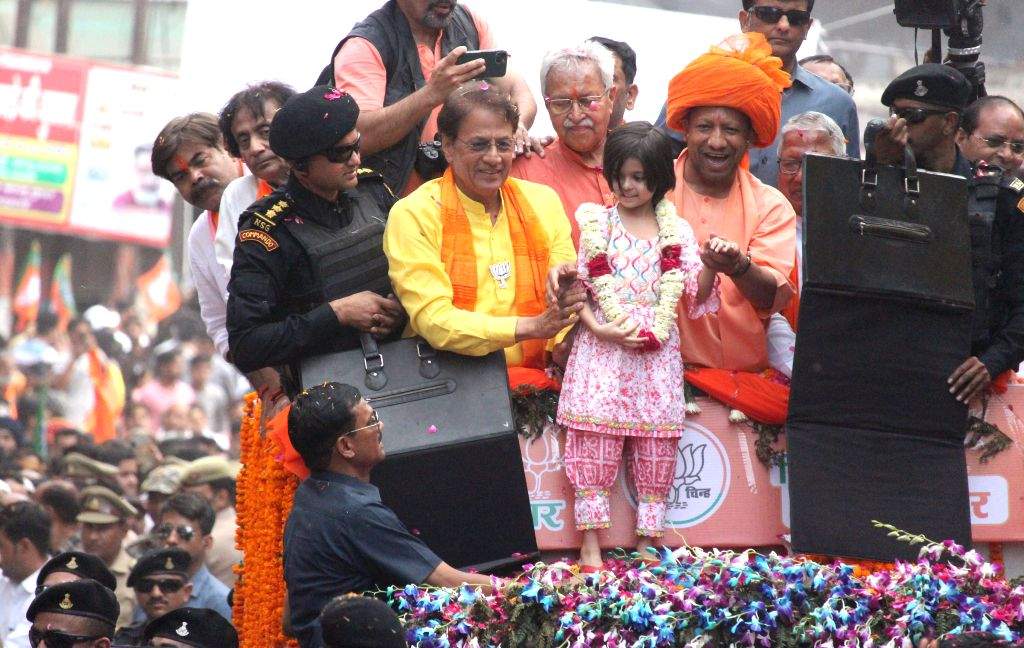 UP CM Yogi Adityanath take part in a road show in favour of party ...