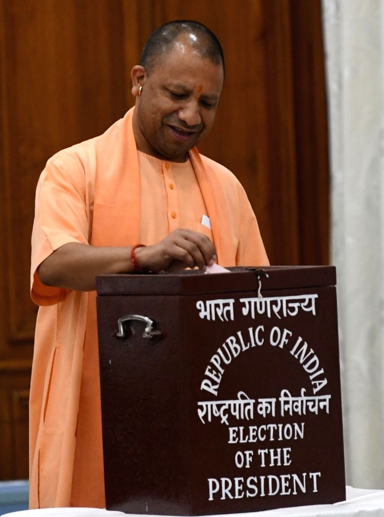 : Lucknow: Uttar Pradesh CM Yogi Adityanath casts his vote for the ...