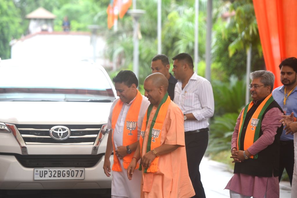 Uttar Pradesh CM Yogi Adityanath arrives to attend all BJP Chief ...