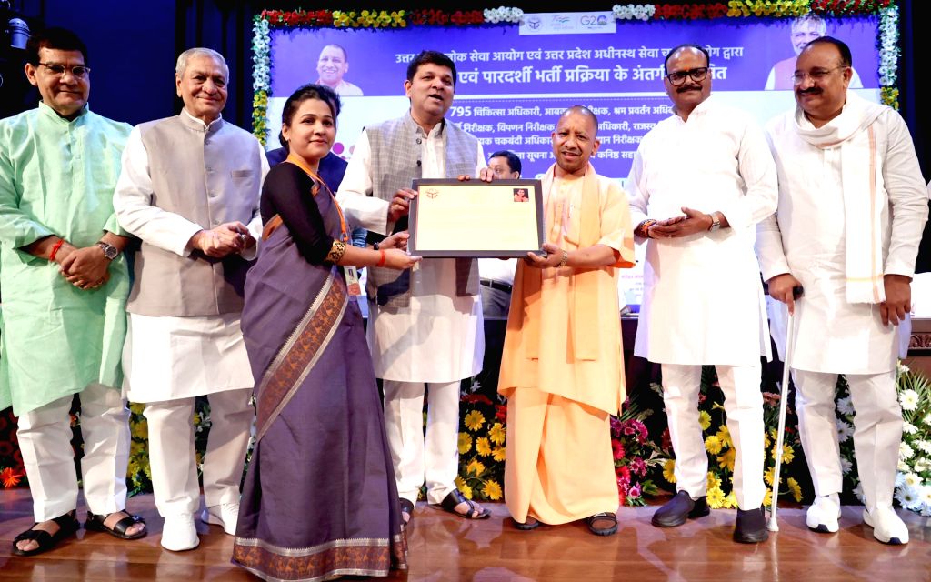 Uttar Pradesh Chief Minister Yogi Adityanath hands over appointment letter