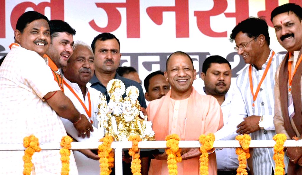 Uttar Pradesh Chief Minister Yogi Adityanath being presented a memento ...