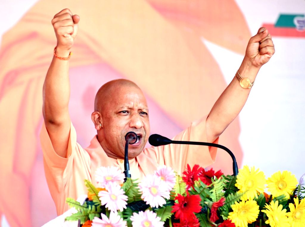 Uttar Pradesh Chief Minister Yogi Adityanath addresses during a public ...