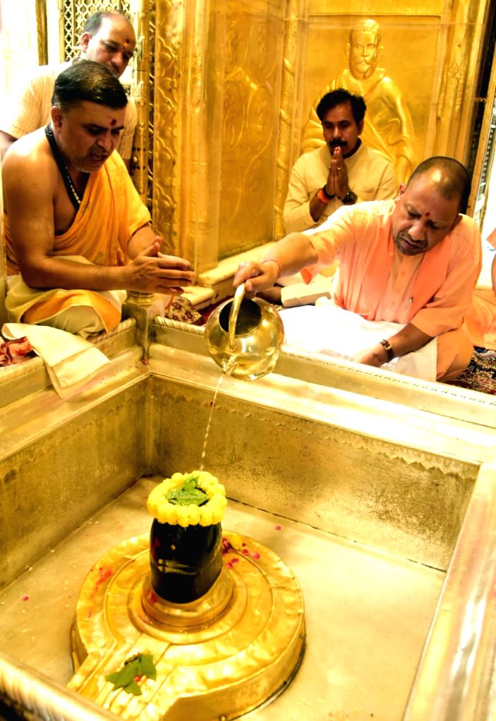 Uttar Pradesh Chief Minister Yogi Adityanath performs a ritual at Kashi ...