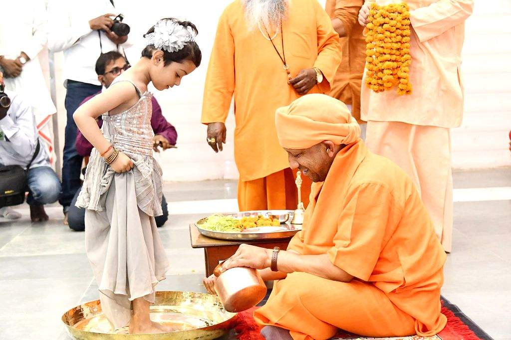Uttar Pradesh Chief Minister Yogi Adityanath performs rituals to a ...