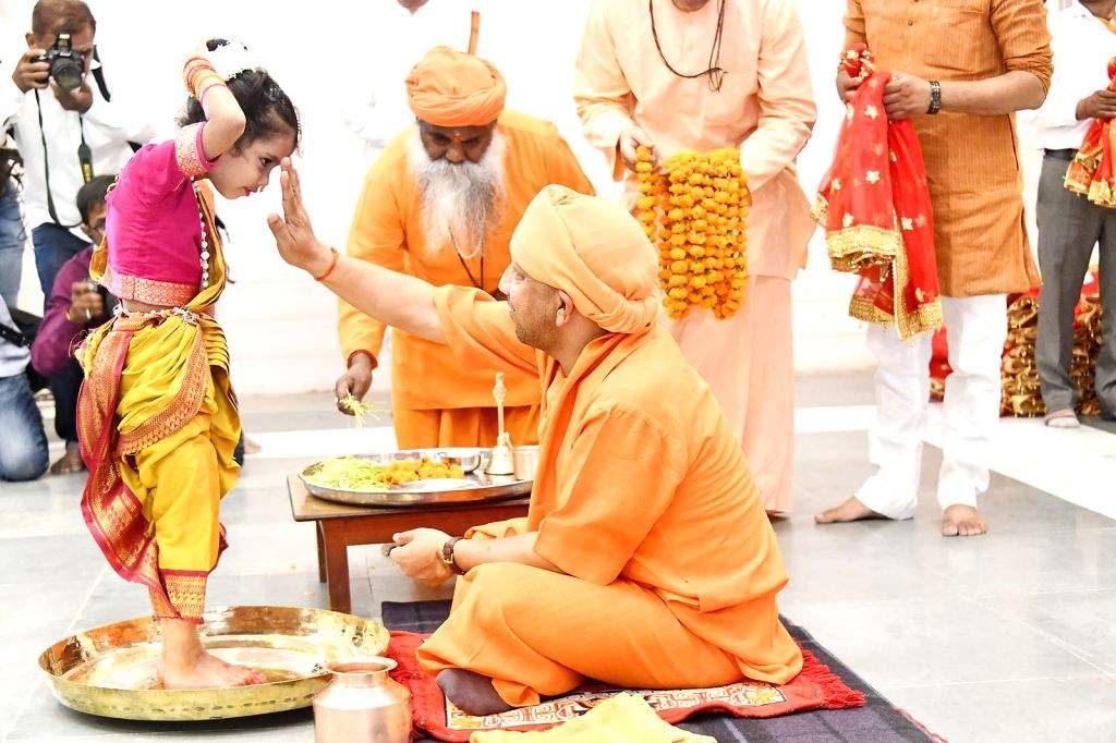 Uttar Pradesh Chief Minister Yogi Adityanath performs rituals to a ...