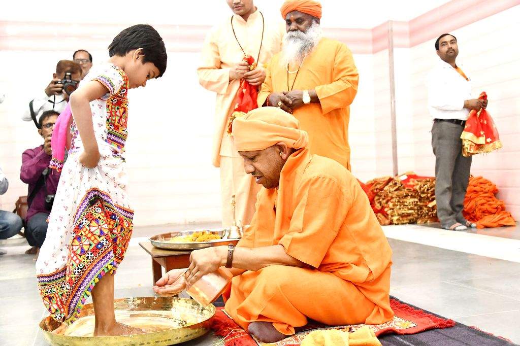 Uttar Pradesh Chief Minister Yogi Adityanath performs rituals to a ...