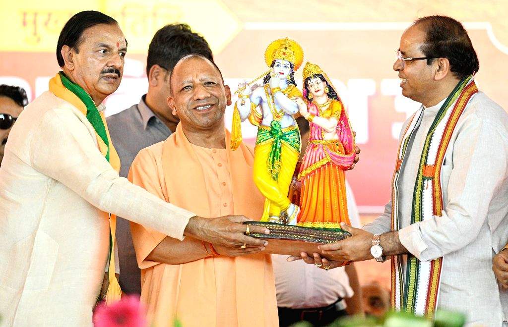 Uttar Pradesh Chief Minister Yogi Adityanath being presented a memento ...